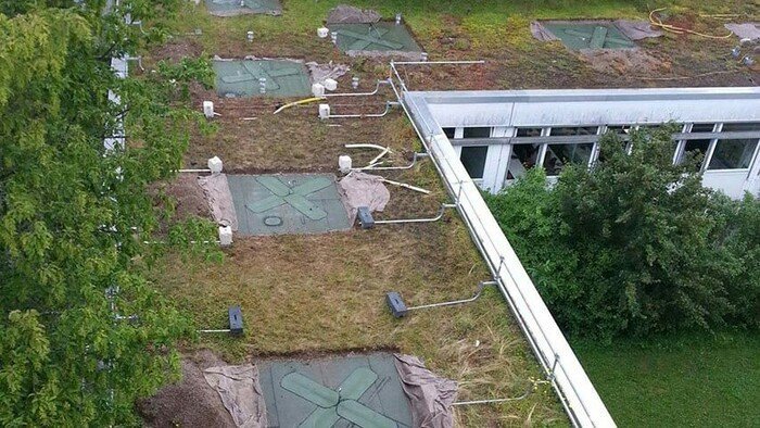 Photo showing a bird's-eye view of a green roof where ABS-Lock OnTop anchors have been set up