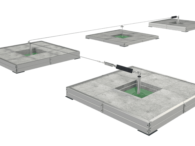 Image showing a lifeline system set up using supports weighted down with concrete slabs