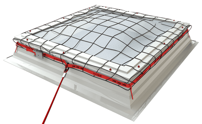 Image showing an ABS DomeWeb safety net after being stretched over a domed rooflight to provide protection against falls